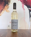 Bottle of Giddy Goose 2025 English white wine from Wressle Vineyard, North Lincolnshire, with a grey label, standing on a wooden table