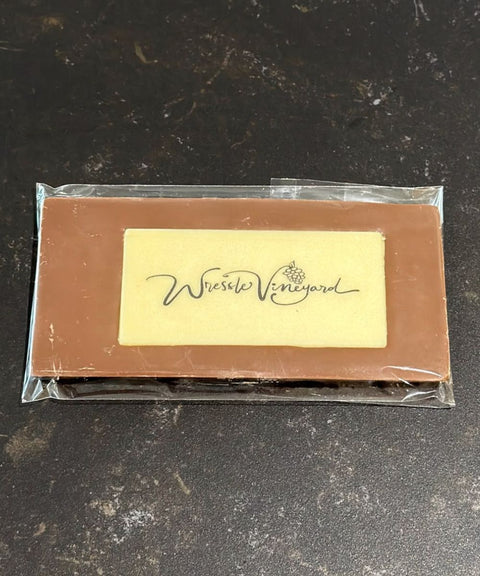 Wressle Vineyard milk chocolate bar with branded white chocolate logo panel, handmade in Lincolnshire